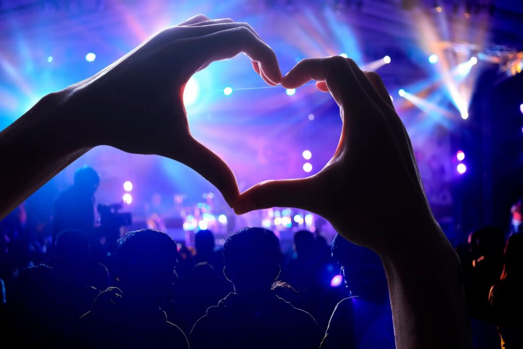 A person making a heart with their hands