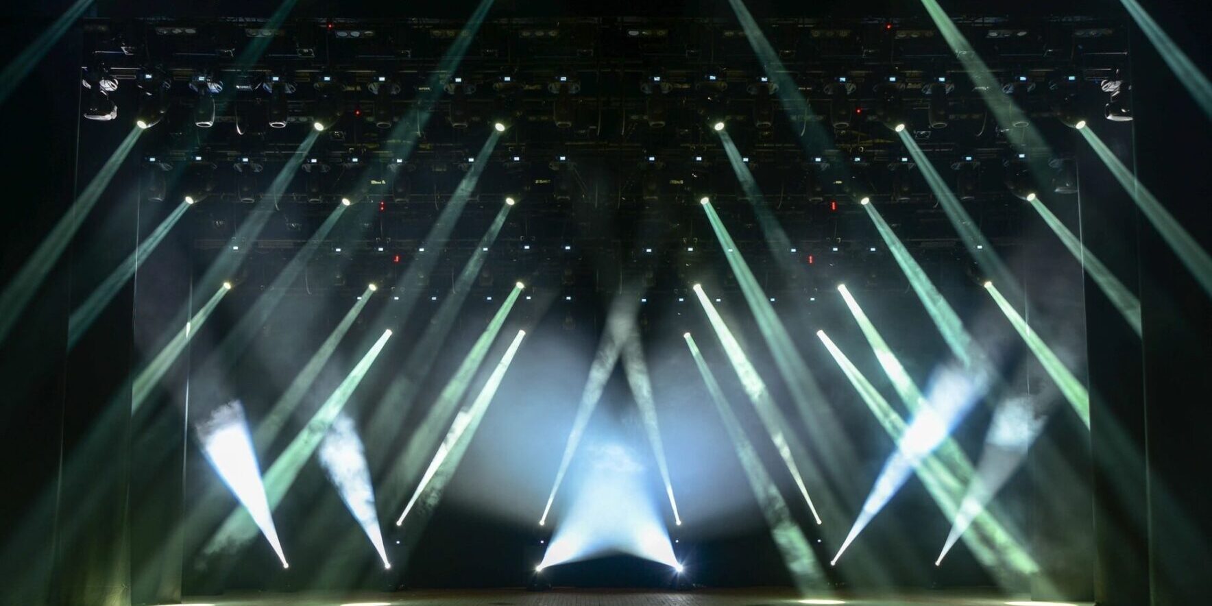 A stage with lights and a light show.